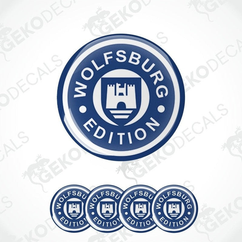 A set of four blue and white vinyl stickers with 'VOLKSWAGEN' and 'Edition' text, and a castle-like design.