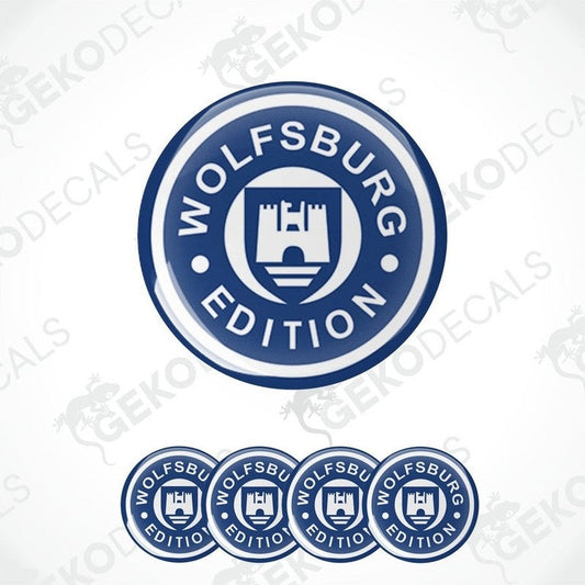 A set of four blue and white vinyl stickers with 'VOLKSWAGEN' and 'Edition' text, and a castle-like design.