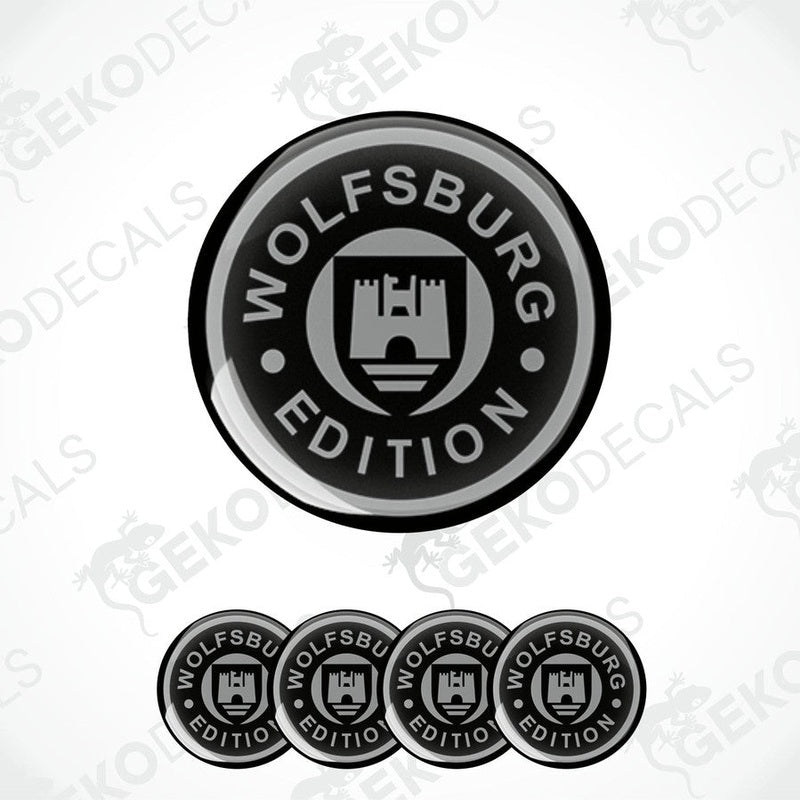A set of four round vehicle decals with the VOLFSBURG EDITION logo in black and silver colors.