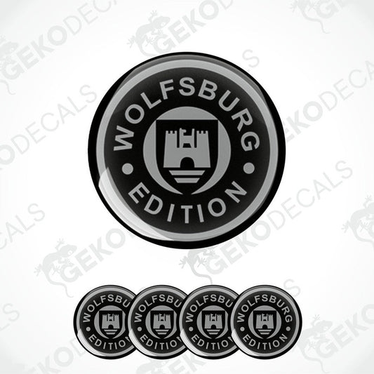 A set of four round vehicle decals with the VOLFSBURG EDITION logo in black and silver colors.