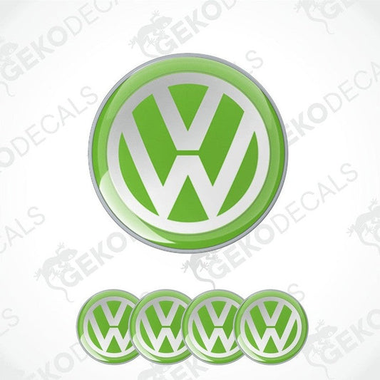 A set of four green vinyl stickers with a dome shape, featuring the Volkswagen logo.
