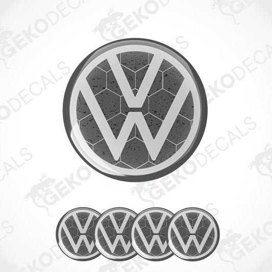 A set of four grey and white volkswagen emblem stickers with a dome shape and a polyurethane coating.