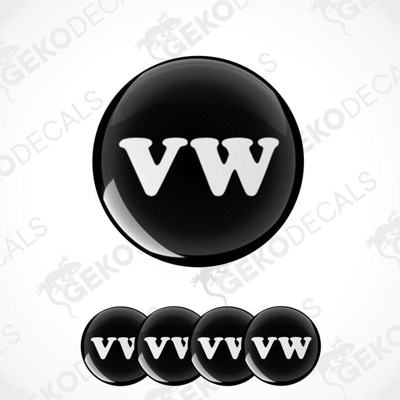 A set of four black vinyl stickers with the word 'VW' in white, indicating a Volkswagen brand theme.