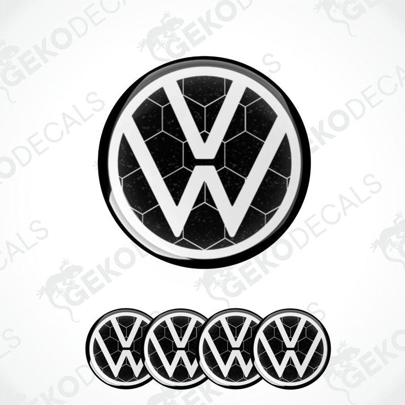 A set of four black and white volkswagen emblem stickers with a dome shape and a polyurethane coating.