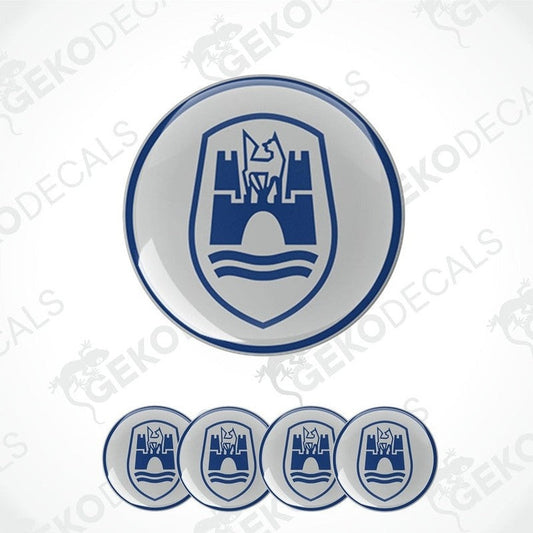 A set of four blue and white vinyl stickers with a castle-like design and the brand name 'VOLKSWAGEN' on them.