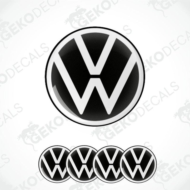 A set of four black and white vinyl stickers with the VOLKSWAGEN logo.
