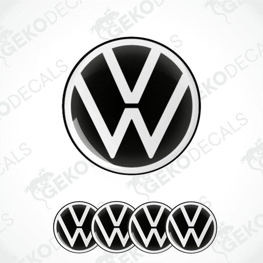 A set of four black and white vinyl stickers with the VOLKSWAGEN logo.