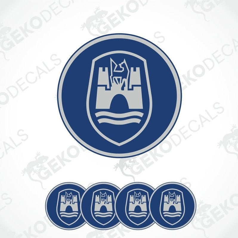 A set of four blue and grey vinyl stickers with a castle-like design and the brand name 'VOLKSWAGEN' on them.
