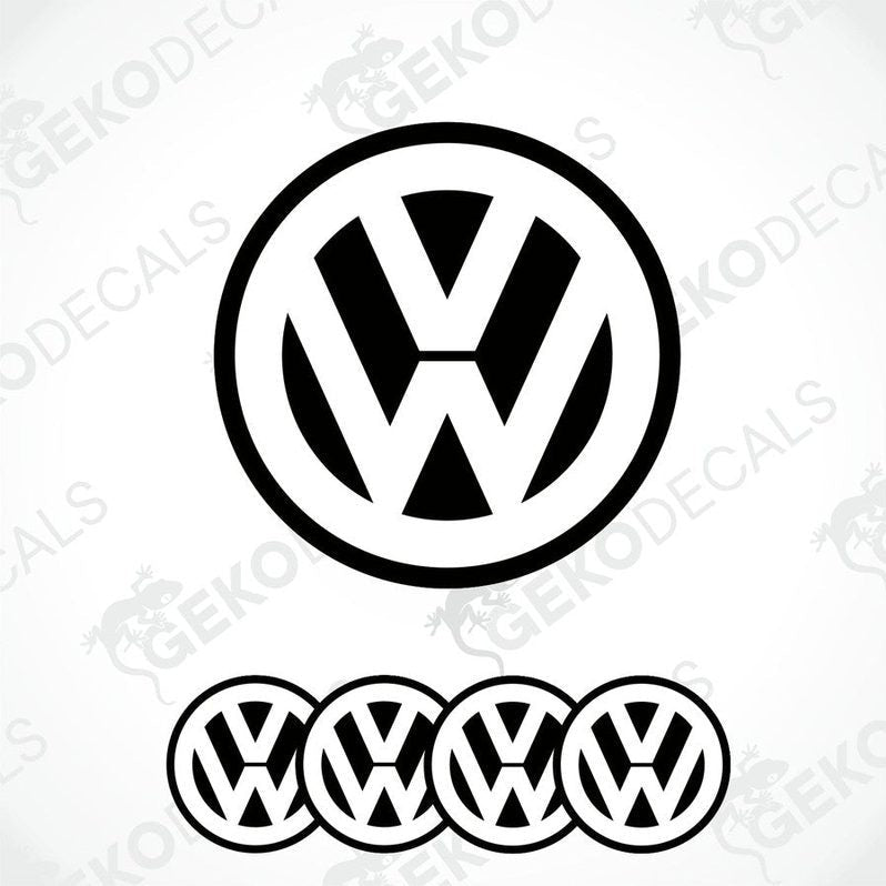 A set of black and white vinyl decals for a Volkswagen vehicle, including one large emblem and three smaller dome stickers.