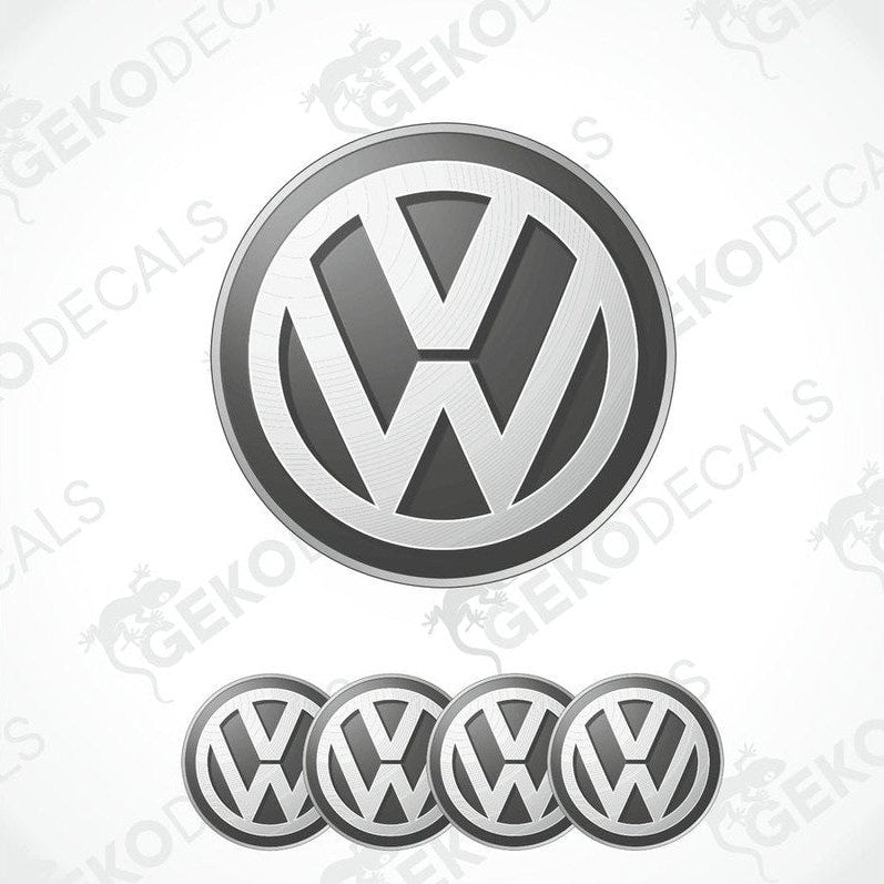 A set of four silver volkswagen emblem stickers with a dome shape, designed for use on car wheels or caps.