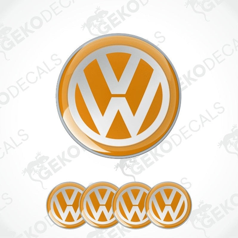 A set of four orange and white dome-shaped vinyl decals with the Volkswagen logo.