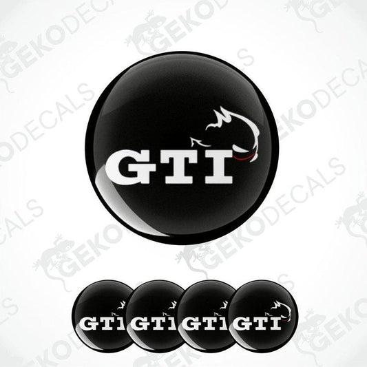 A set of four black vinyl stickers with the letters 'GTI' and a graphic design, displayed on a white background.