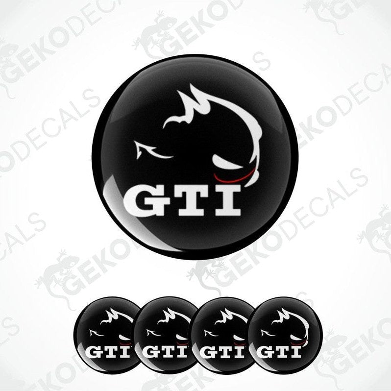 A set of black vinyl decals with the GTI logo on them, displayed on a white background.