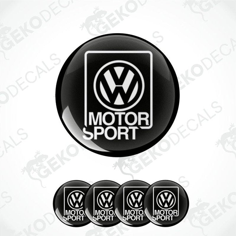 A set of four black and white vinyl decals with the 'Volkswagen Motor Sport' logo.