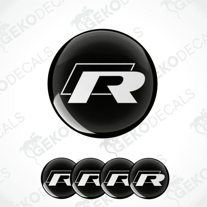 A set of four vinyl decals featuring the Volkswagen R logo in black and white.