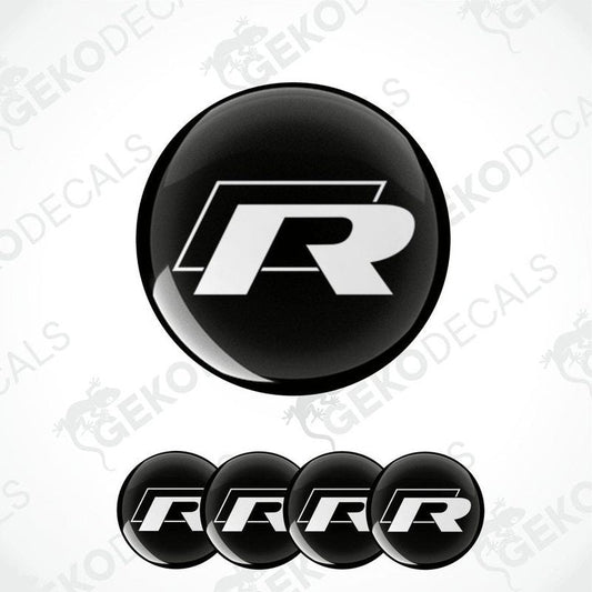 A set of four vinyl decals featuring the Volkswagen R logo in black and white.