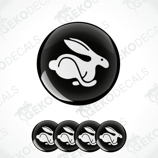 A set of vinyl decals featuring a white Volkswagen rabbit on a black background, designed for use as car stickers.