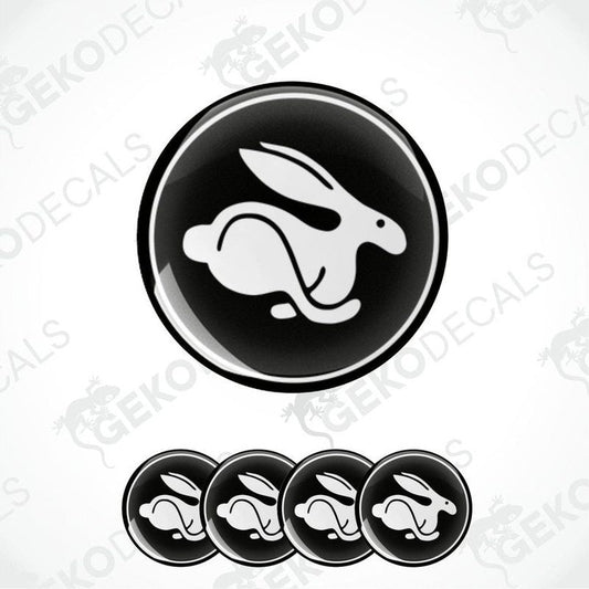 A set of vinyl decals featuring a white Volkswagen rabbit on a black background, designed for use as car stickers.
