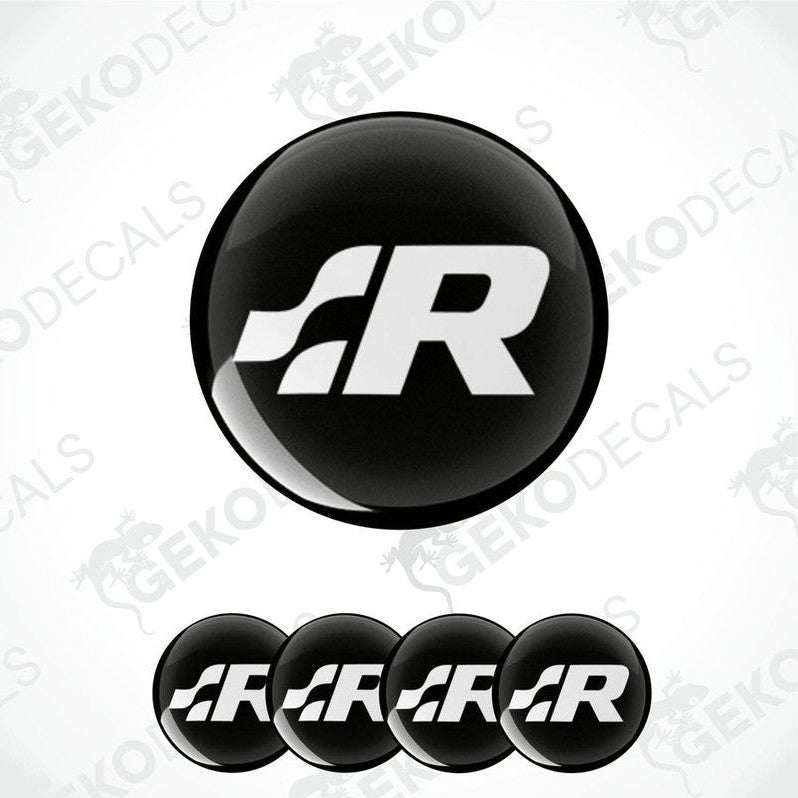 A set of four vinyl decals featuring the Volkswagen R logo in black and white.