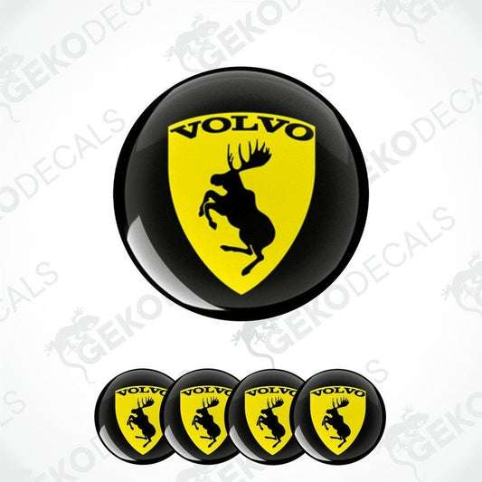 A set of four black vinyl stickers with the Volvo brand logo and a depiction of a reindeer. The stickers have a glossy finish.