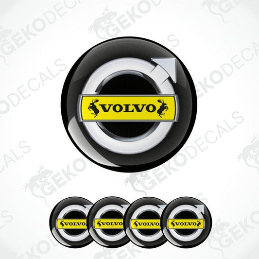 A set of four black vinyl stickers with the Volvo brand logo in yellow.