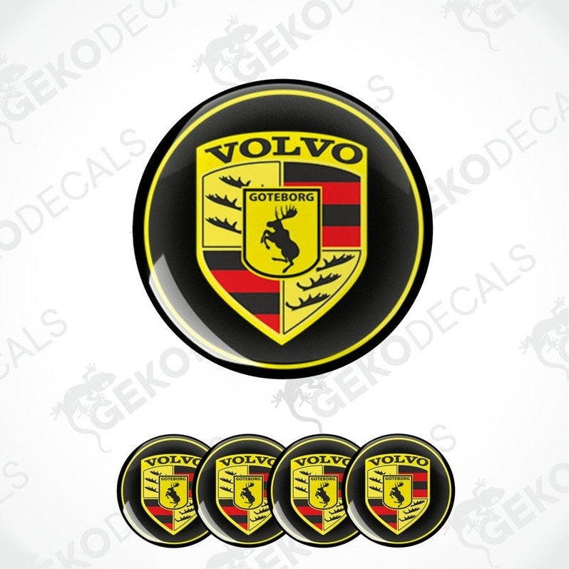 A set of four black, yellow, red, and white volvo branded vinyl stickers, with a dome shape designed for use on car wheels or caps.