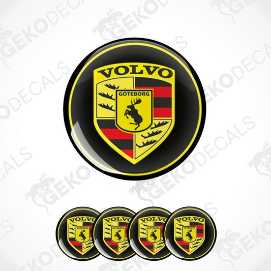 A set of four black, yellow, red, and white volvo branded vinyl stickers, with a dome shape designed for use on car wheels or caps.