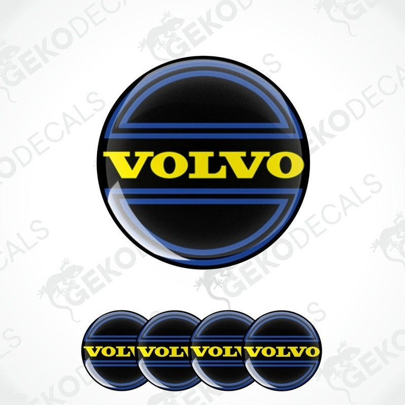 A set of four Volvo branded vinyl stickers with a blue and yellow design, intended for use on car wheels or caps.