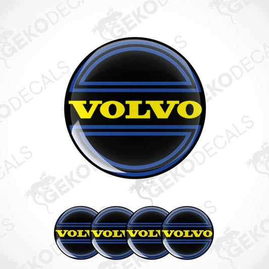 A set of four Volvo branded vinyl stickers with a blue and yellow design, intended for use on car wheels or caps.