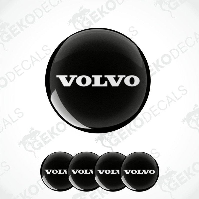 A set of black vinyl decals with the 'VOLVO' brand logo, intended for use as car stickers.