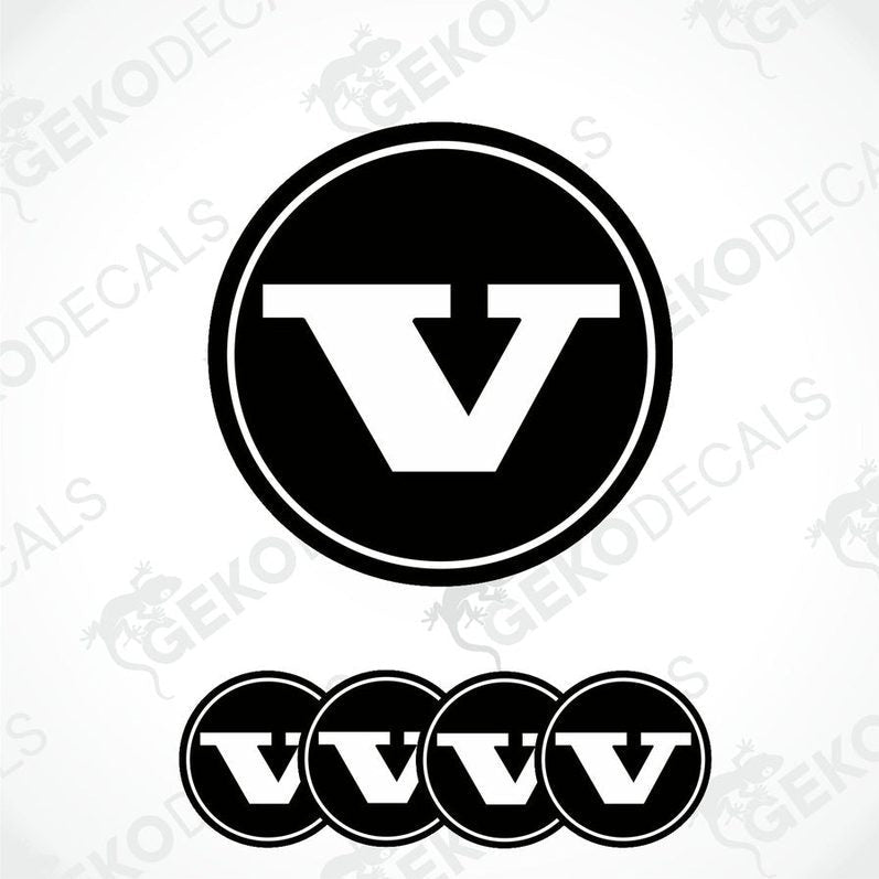 A set of four black vinyl stickers with a bold letter 'VOLVO' in the center, arranged on a white background. The stickers have a glossy finish.