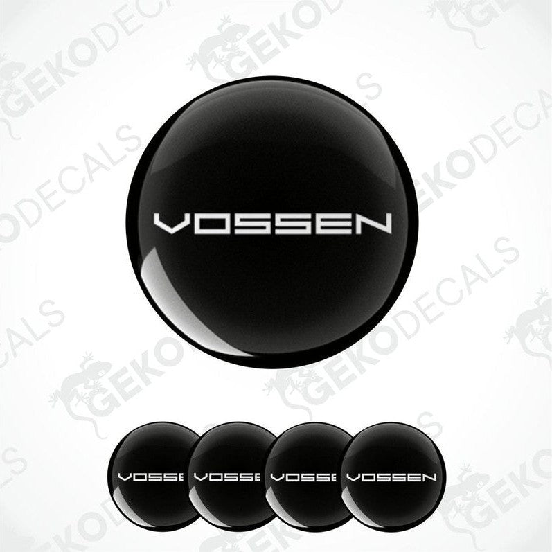A set of four black vinyl stickers with the word 'VOSSEN' printed on them, presented against a white background.