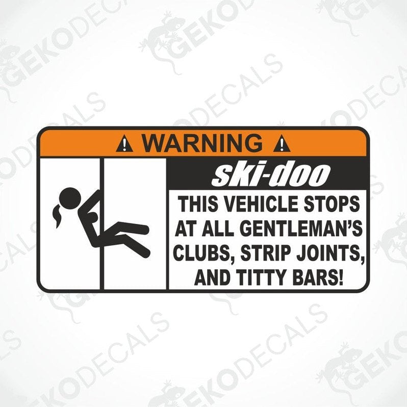 A black and orange vehicle decal with the text 'WARNING' and a graphic of a person performing a stunt on a vehicle.