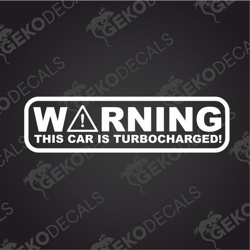 A white rectangular car decal with the text 'WARNING THIS CAR IS TURBOCHARGED!' in bold uppercase letters.