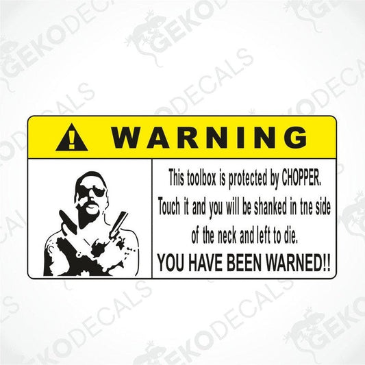 A yellow warning sticker with a graphic of a man and text indicating a humorous message.